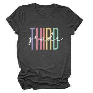 Close-up of the artistic THIRD grade colorful letter print on a dark gray cotton t-shirt