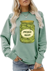 Detail of sage green hoodie featuring ribbed cuffs and Pickle Slut graphic print