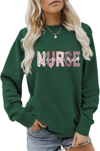 Detail of Registered Nurse pink and white lettering print on dark green crewneck sweatshirt