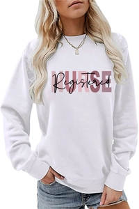 Detail of NURSE Registered pink and black lettering on a white crewneck sweatshirt