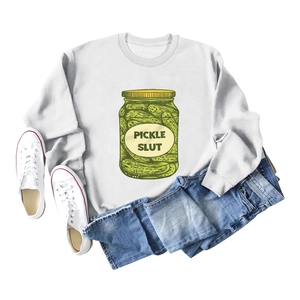 Flat lay of gray long sleeve sweatshirt with Pickle Slut graphic and denim shorts