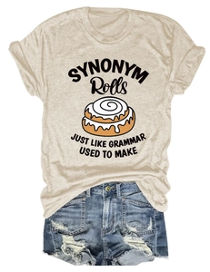 Flat lay of beige Synonym Rolls graphic tee paired with frayed blue denim shorts