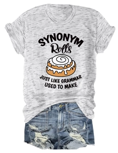Flat lay of gray SYNONYM Rolls printed t-shirt paired with distressed blue denim shorts