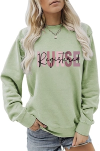 Detail of Registered Nurse graphic print on sage green crewneck sweatshirt for women
