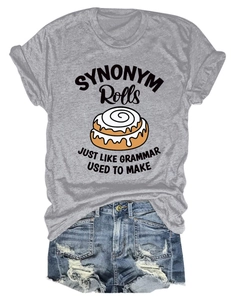 Flat lay of gray cotton T-shirt featuring SYNONYM Rolls print and distressed denim shorts
