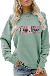 Detail of sage green sweatshirt with pink Nurse Registered letter print on soft fabric