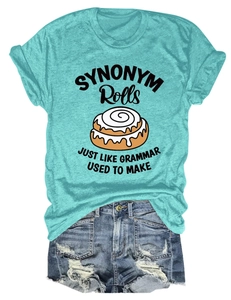 Detail of teal t-shirt with cinnamon roll print and distressed denim shorts set