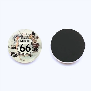 Detailed front and back view of a 25mm Route 66 glass fridge magnet with magnetic backing