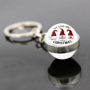 Christmas double-sided glass ball keychain with festive gnomes and Merry Christmas message