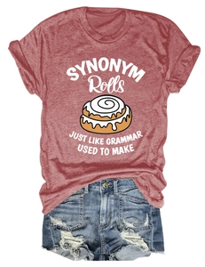 Flat lay of a red graphic tee with SYNONYM Rolls print and distressed denim shorts