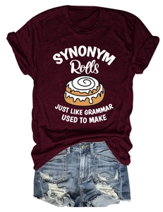 Flat lay of a wine red cotton T-shirt with graphic print and ripped denim shorts set