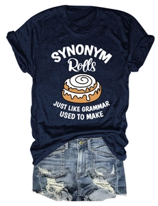 Detail of navy cotton T-shirt featuring cinnamon roll print and denim shorts with frayed edges