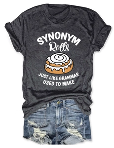 Flat lay of gray cotton T-shirt featuring SYNONYM Rolls print and denim shorts