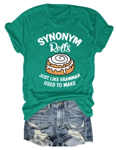Close-up of green crew neck T-shirt with vintage cinnamon roll print and denim shorts