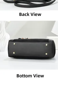 Détails de la base du sac avec des clous en métal doré et des coutures en cuir premium