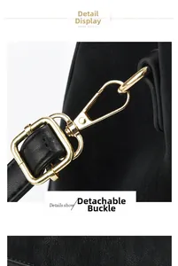 Gros plan du fermoir amovible doré et des finitions sur un sac à main en cuir noir
