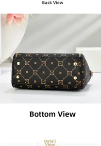 Detail view of printed Boston bag featuring metal bottom studs and leather texture
