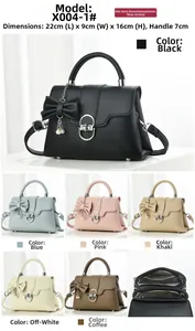Detailed size specifications for vintage top-handle bag with hardware lock and bow charm