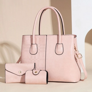 Three-piece rose pink tote bag set with striped texture and golden hardware accents