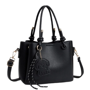 Classic black litchi texture handbag with top handles and a dog charm for women