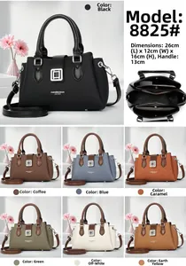 Detailed view of fashionable tote bag with silver buckle and internal multi-layer storage