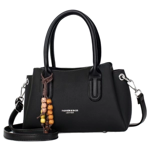 Black pebbled leather handbag for women with beaded charm and adjustable strap