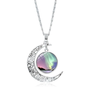 Silver hollow moon pendant necklace featuring purple and green aurora borealis crystal