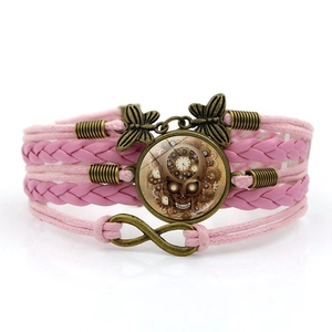 Pink leather steampunk skull clock bracelet with bronze butterfly and infinity charms