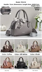 Detail showing various colors of the faux leather handbag with decorative silk scarf