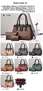 Close-up of three-piece tote bag set with textured leather and metal hardware details