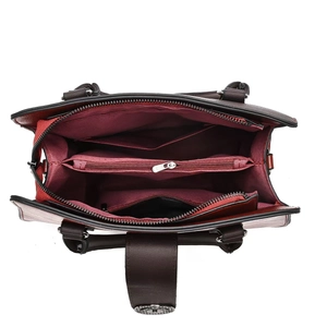 Internal structure of the large shoulder bag with multiple compartments and dark red lining