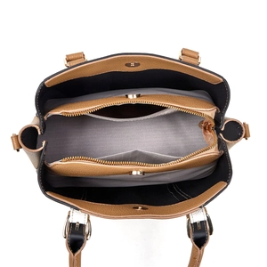 Internal view showing brown leather tote bag compartments and wave pattern lining