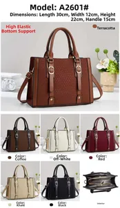 Detailed view of color-block tote bag with metal ring and precise interior construction