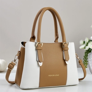 Brown and white bicolor tote bag with lychee texture and adjustable shoulder strap