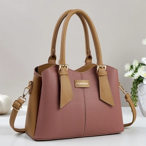 Chic color-block handbag in pink and brown lychee leather with gold metal logo