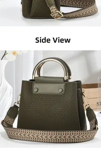 Detail view of olive green bucket bag with knit texture and geometric woven strap