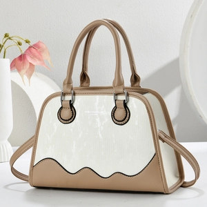 Elegant beige and khaki crossbody bag with wave texture base and twin handles