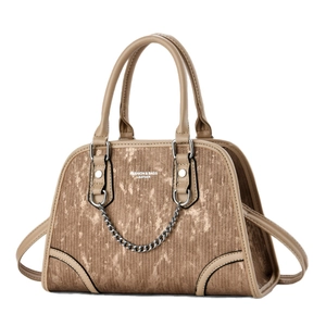Chic bronze textured bowling handbag with leather handles and silver chain detail