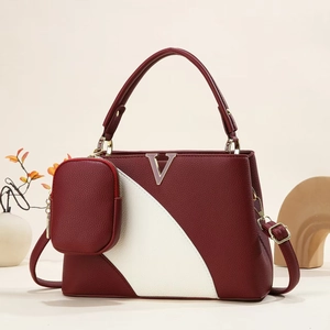Contrast panel faux leather handbag with golden V hardware and small round coin purse