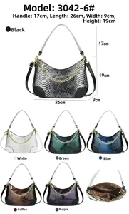 Detailed view of snake skin pattern handbag with internal compartments and dimensions
