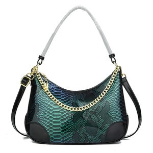 Blue-green snakeskin embossed Hobo bag with gold chain strap and moon silhouette