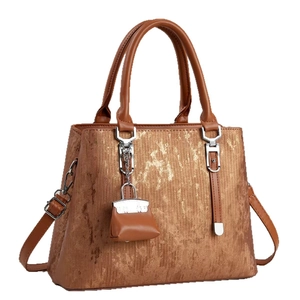 Retro brown faux leather tote bag with vertical texture and adjustable shoulder strap