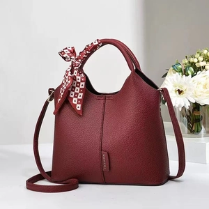 Dark red lychee pattern bucket bag with silk scarf handle and detachable shoulder strap