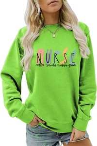 Close-up of Nurse Coffee Scrubs print on neon green crewneck sweatshirt fabric