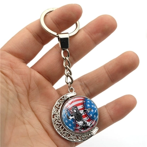 US flag baseball keychain with 360-degree rotating moon pendant and catcher design
