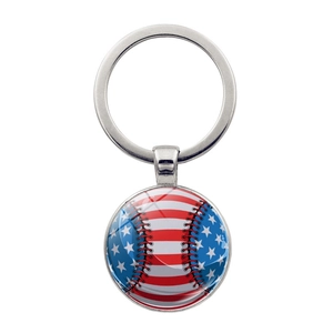 Detail of round glass dome keychain featuring American flag baseball graphic on silver metal