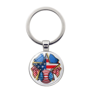 Detailed close-up of a silver keychain featuring a round USA flag and baseball design