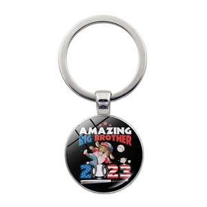 Close-up of baseball bear pendant keychain with Amazing Big Brother 2023 design