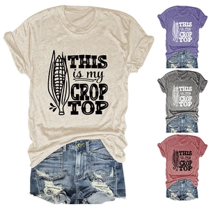 Detailed view of casual crop top t-shirts in multiple colors with humorous graphic print