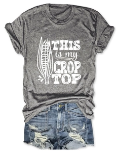 Detail of dark grey cotton T-shirt featuring THIS IS MY CROP TOP print and denim shorts
